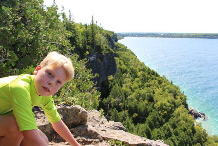 Nathan exploring the cliffs along Georgian Bay