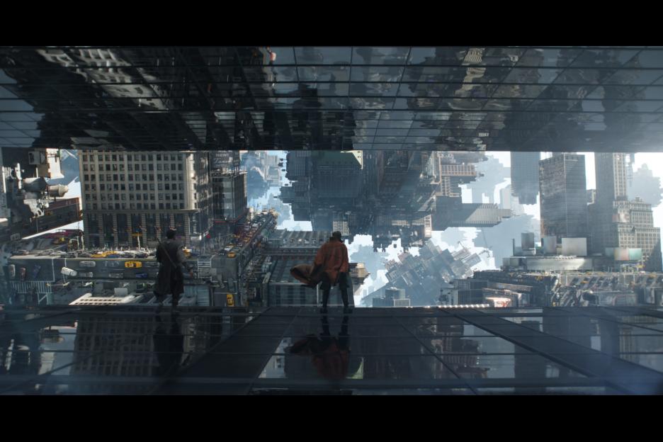 Doctor Strange and Mordo stand on the edge of a skyscraper.