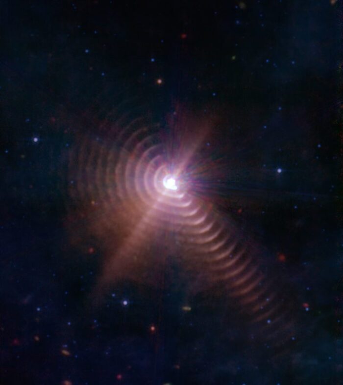 This binary star's dust halo acts like tree rings